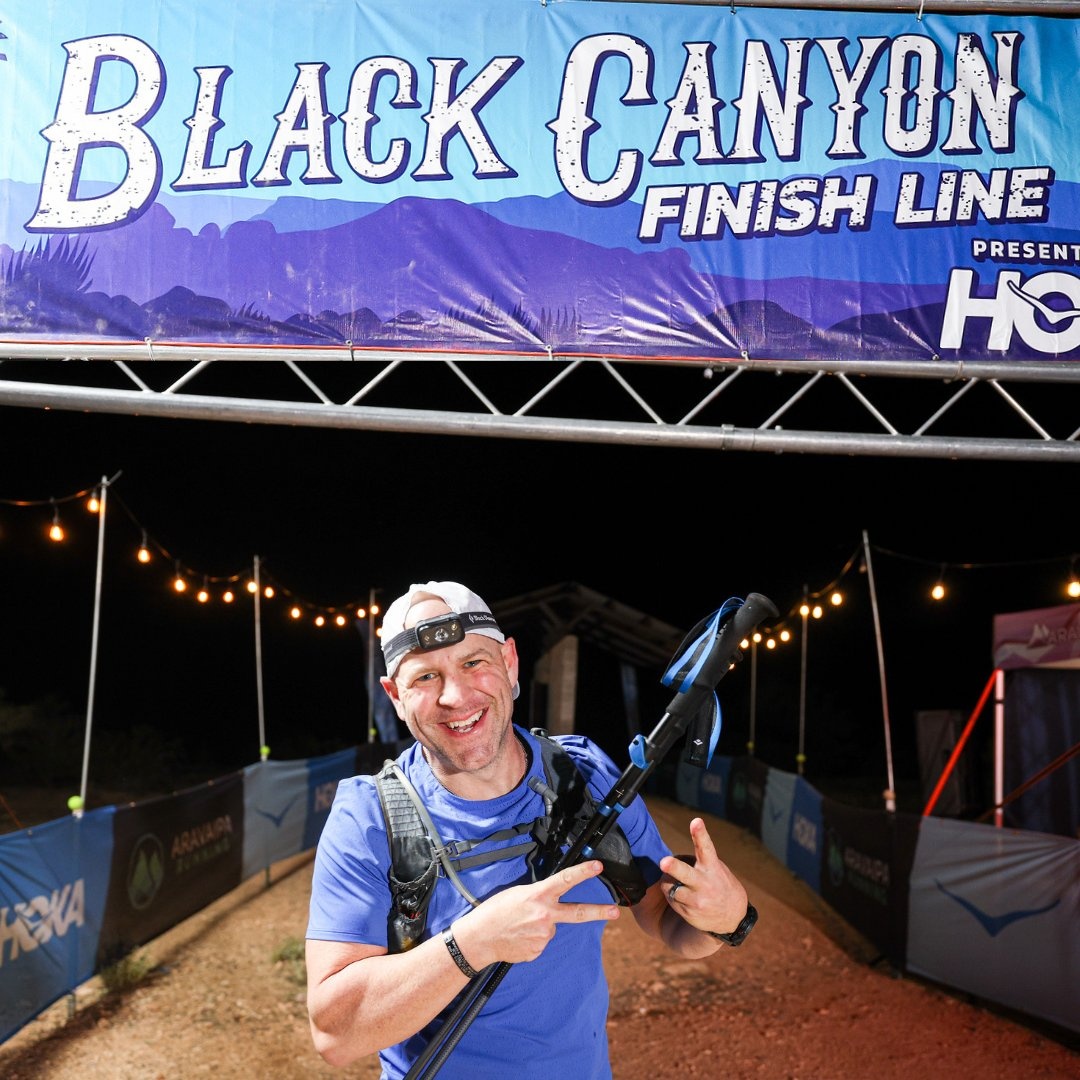 David Atkins crossing the Black Canyon 100K ultramarathon finish line — 62 miles through the Arizona desert
